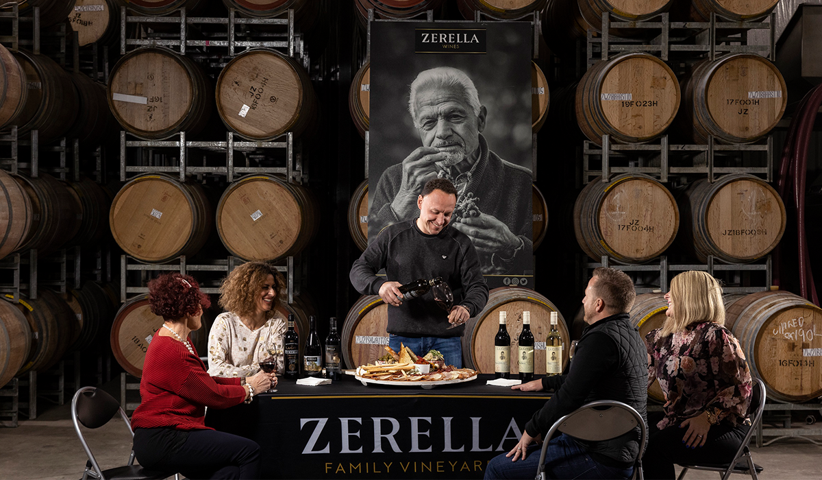 People seated at table in Zerella winery